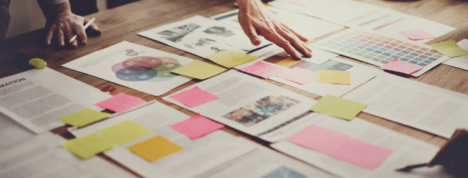 Documents spread across a table